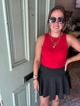 Load image into Gallery viewer, Solid color athletic skorts feature under shorts w/pockets