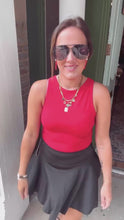 Load and play video in Gallery viewer, Solid color athletic skorts feature under shorts w/pockets
